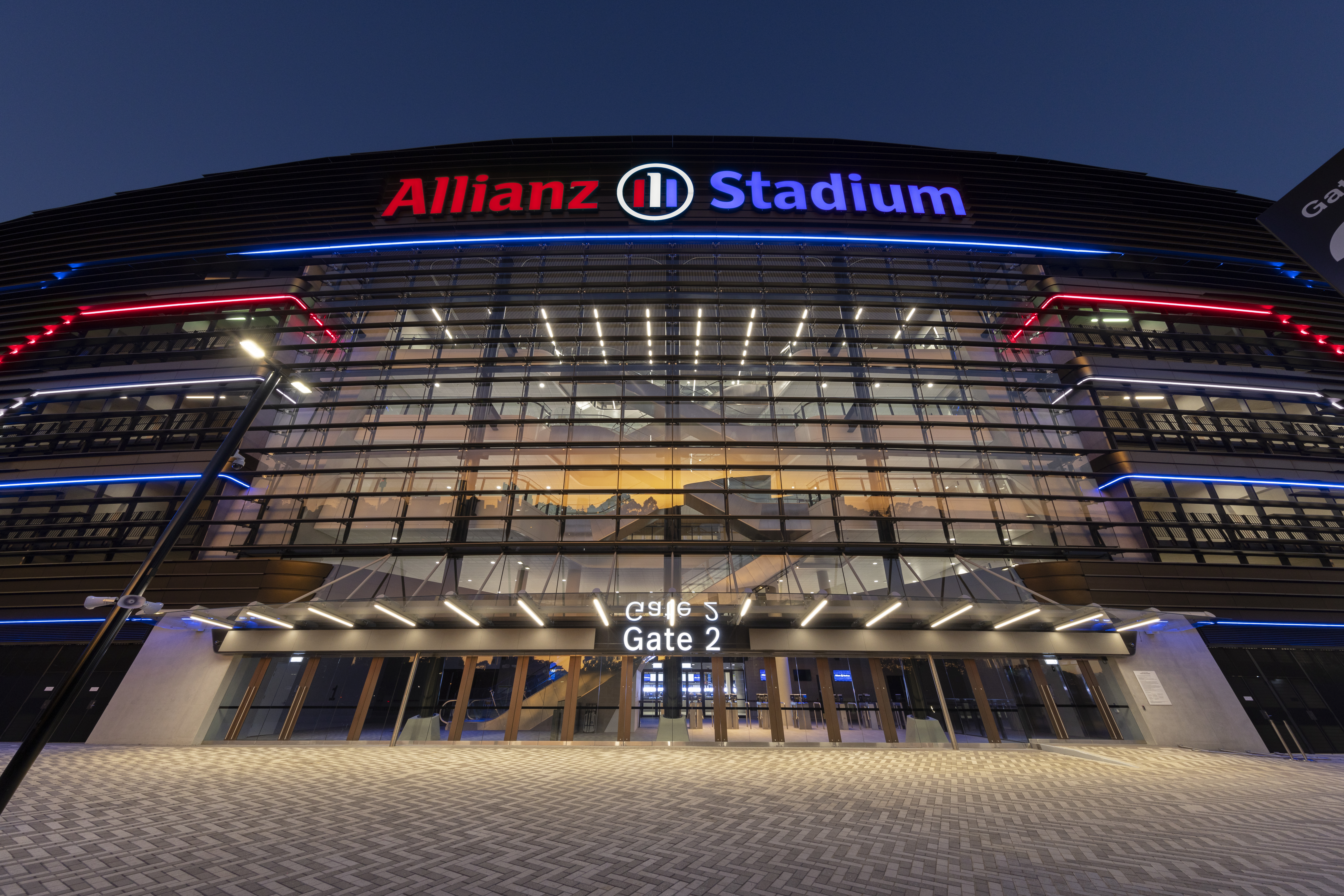 Allianz Stadium entrance illuminated at night