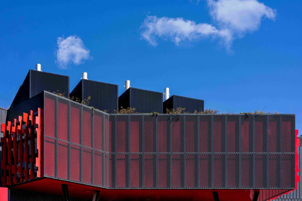 Red-screened data centre façade