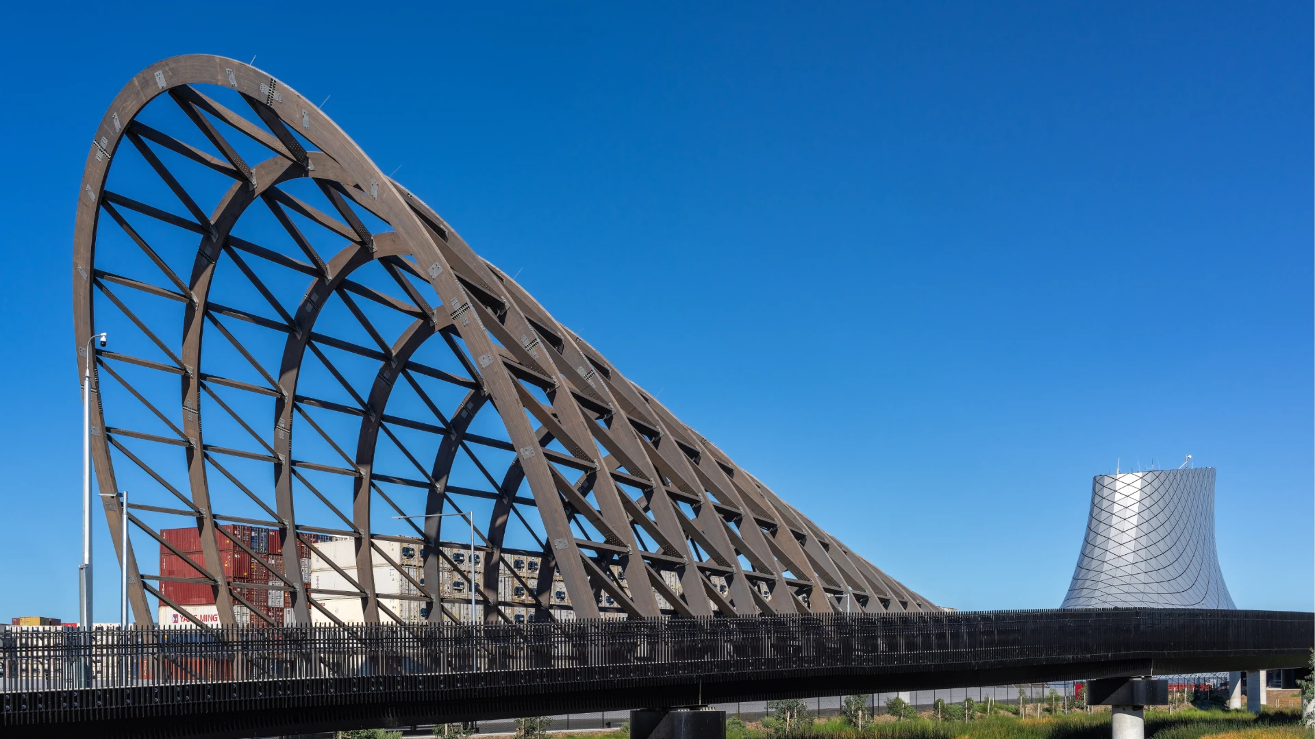 Arched transport interchange and roadway