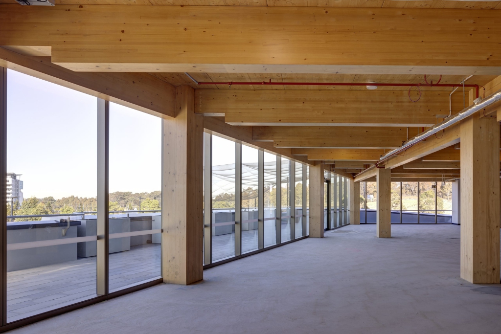 Timber columns inside The Bond in Norwest